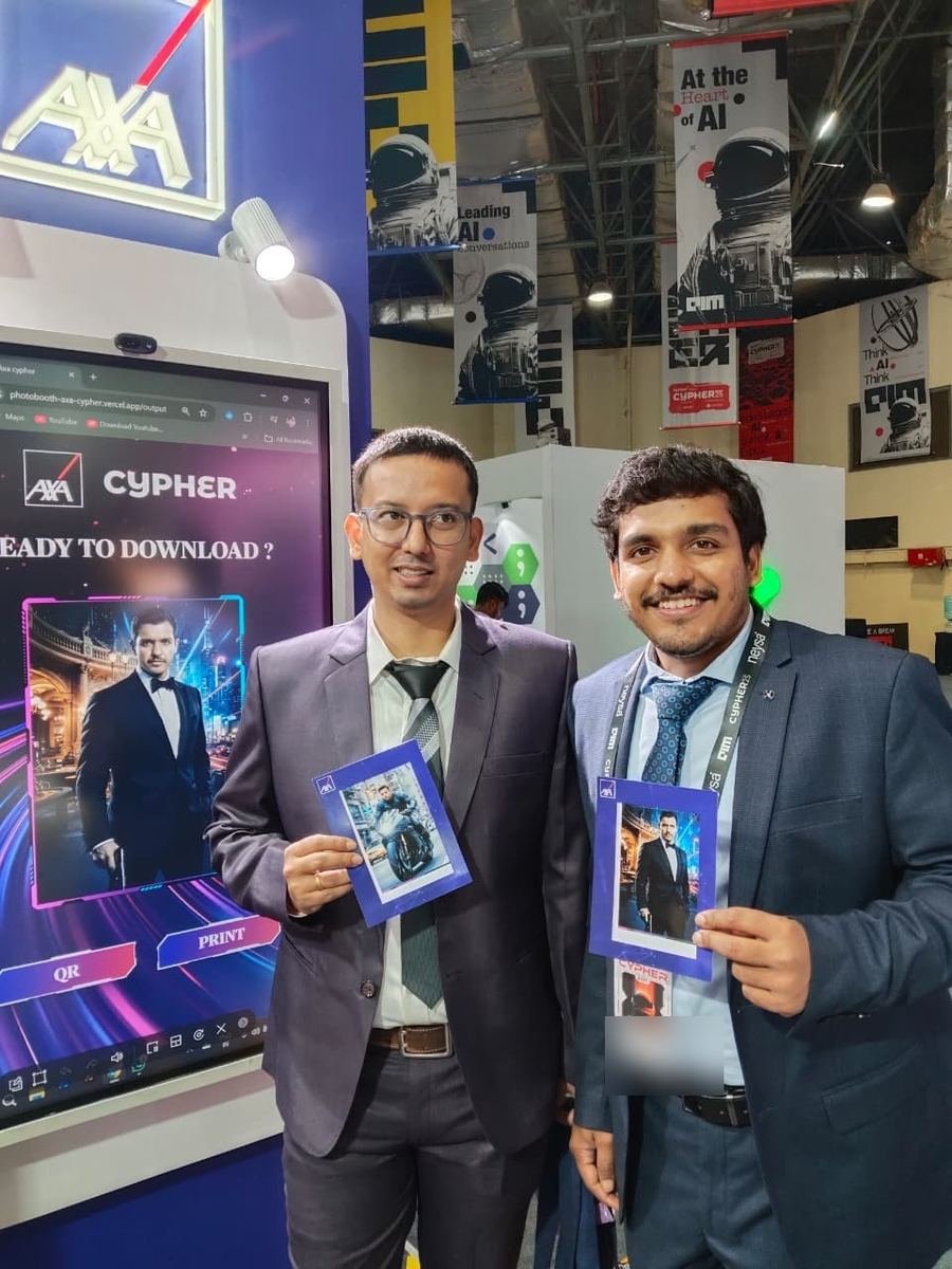 Two visitors holding their printed AI avatars at the AXA booth