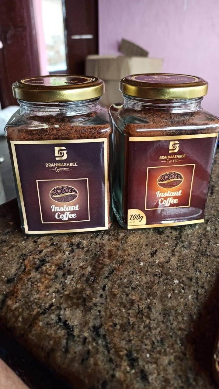 Brahmashree Instant Coffee jars on a granite counter
