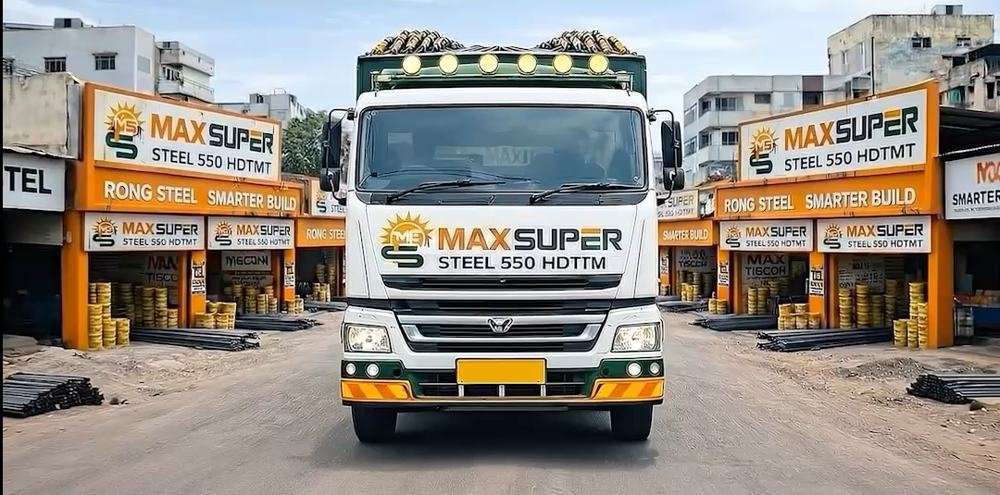 Scene from the ad film: a Max Super branded truck at a dealer yard